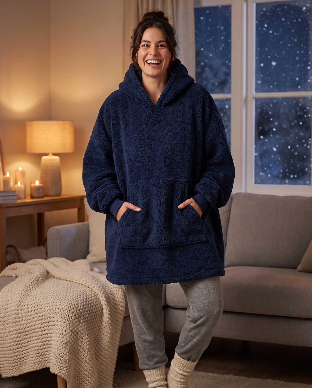 MAPLE hooded wearable blanket in Navy Blue, hands in the front pocket